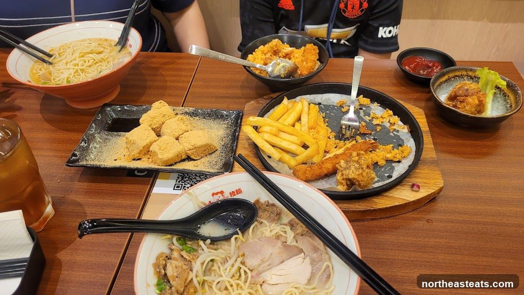 Table with Ramen and Fried Food