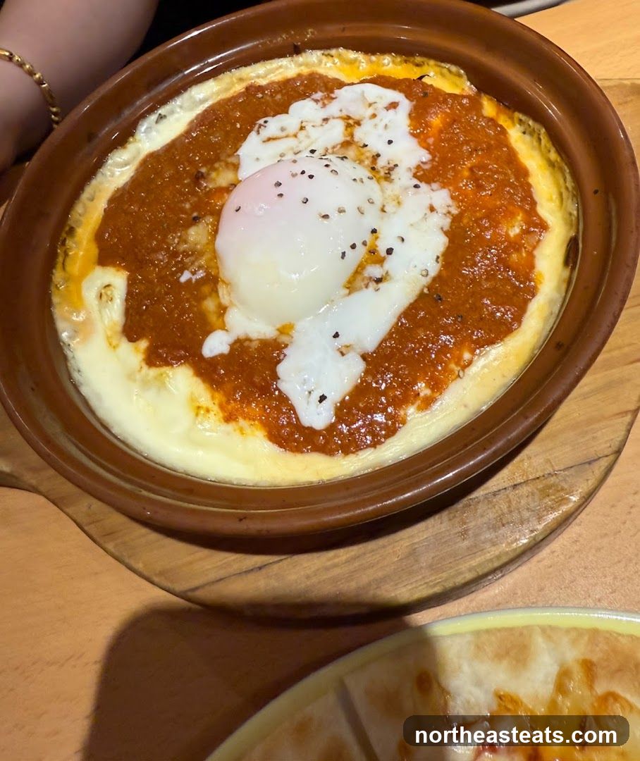 Baked Egg Dish with Tomato Sauce and Cheese