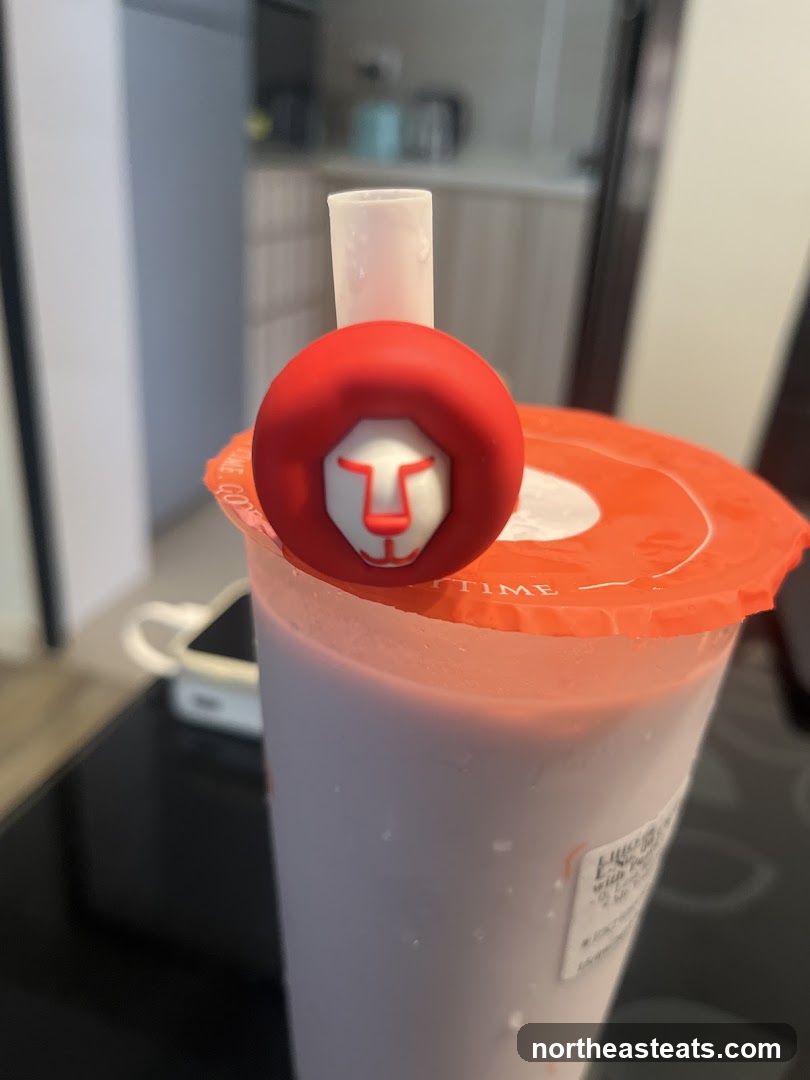Beverage with Lion Charm