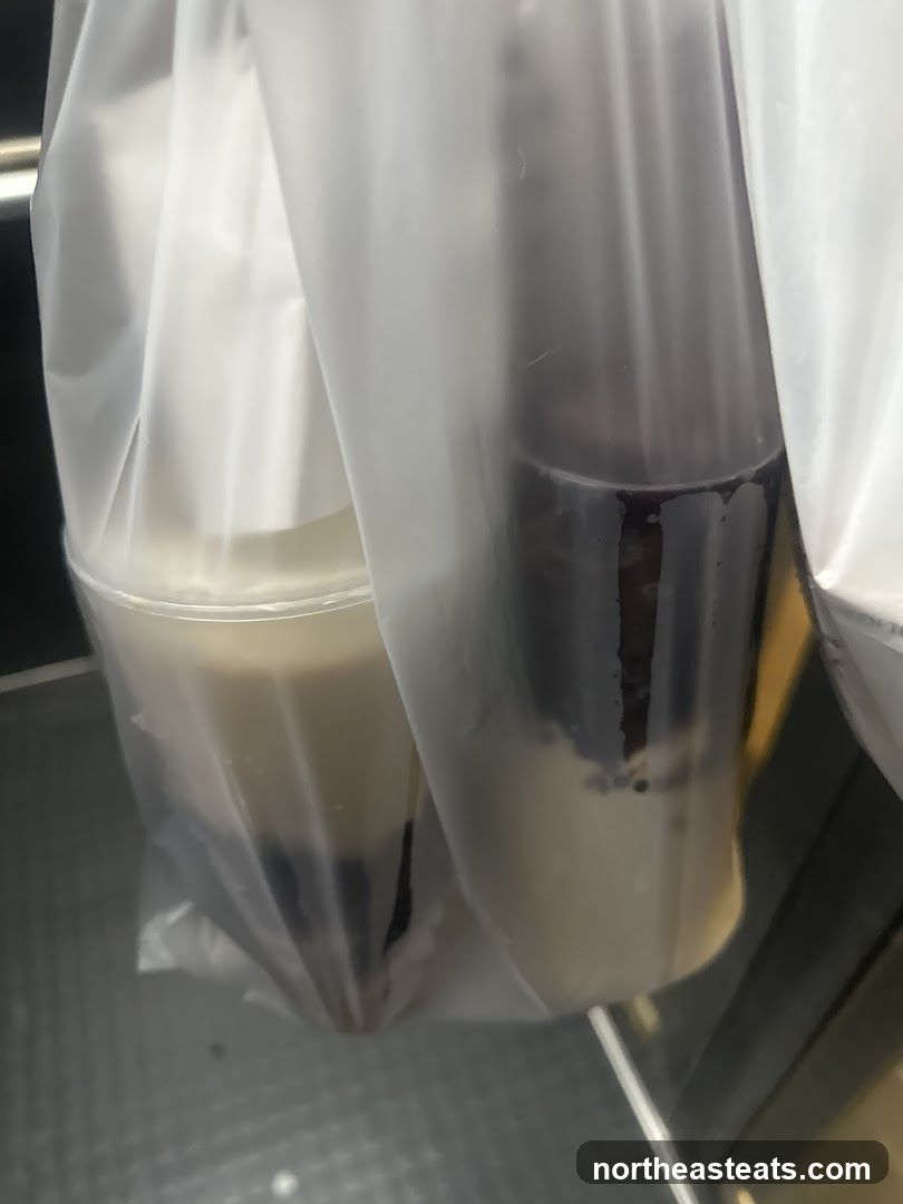 Two drinks in plastic bags