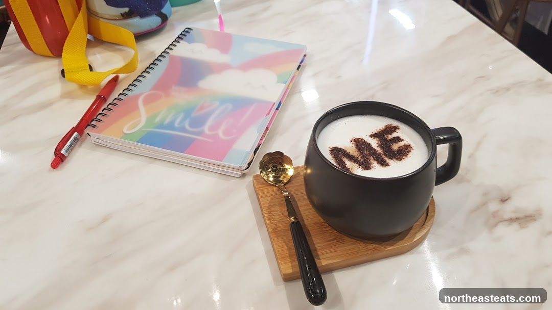 Coffee with "ME" art