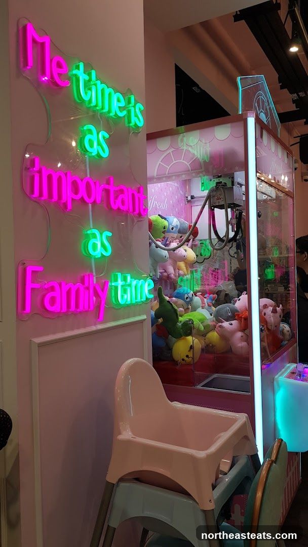 Neon Sign and Claw Machine