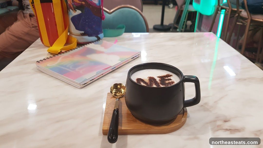 Latte with "ME" design