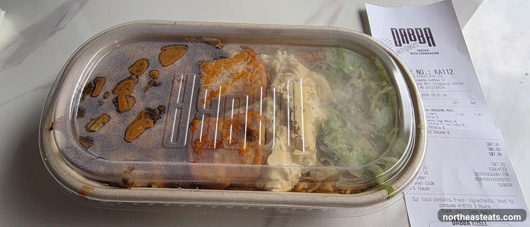 Takeout Container with Food and Receipt