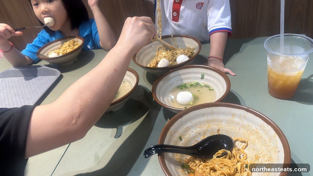 Family enjoying noodles