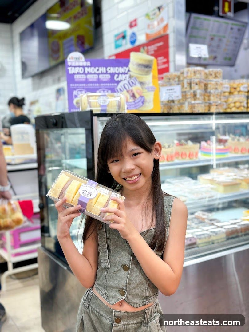 Girl holding a cake