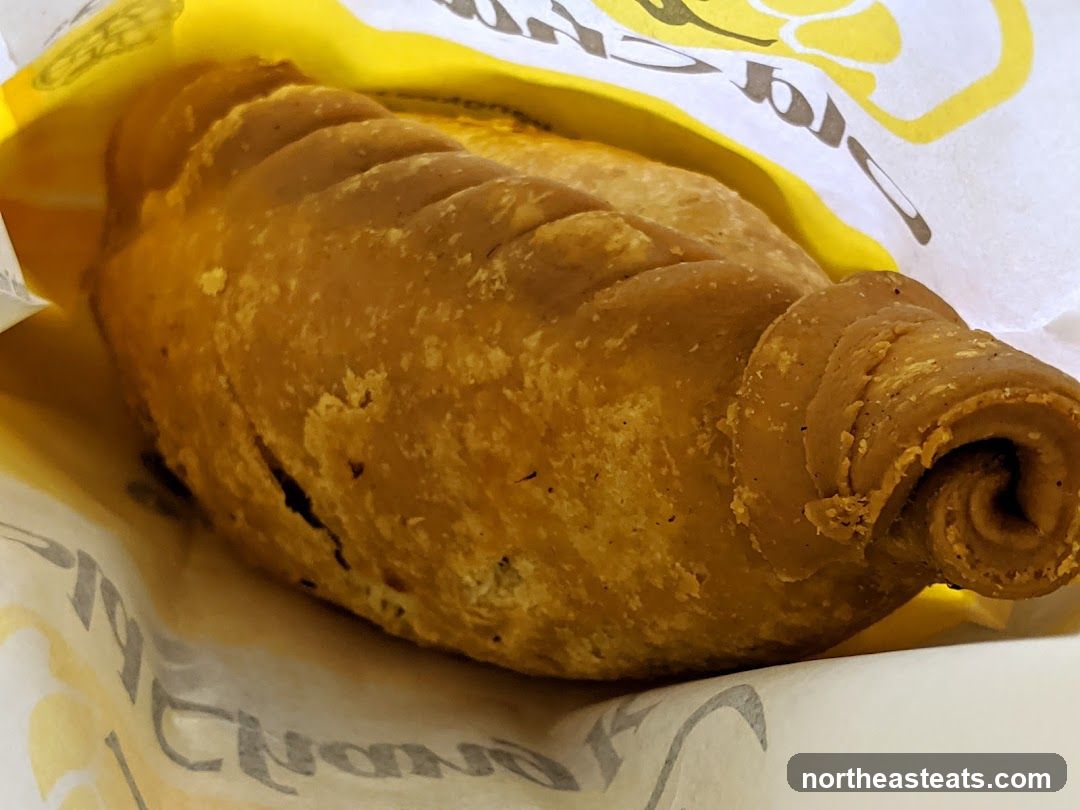 Close-up of a pastry in a yellow wrapper