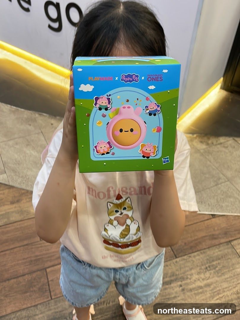 Child holding a toy box