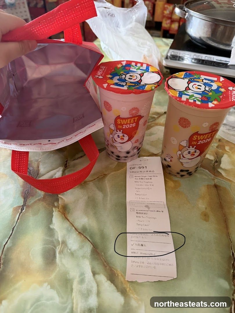 Two bubble teas and a receipt