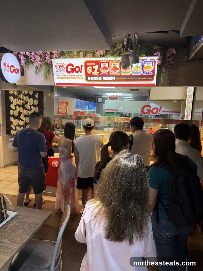 Food stall with promotional signage
