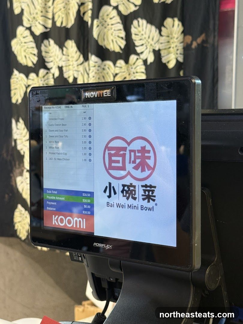 POS system screen with order details and logo
