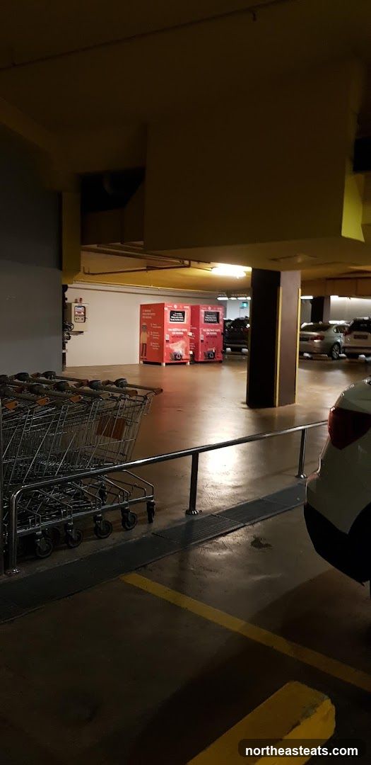 Parking Lot with Shopping Carts and Vending Machines