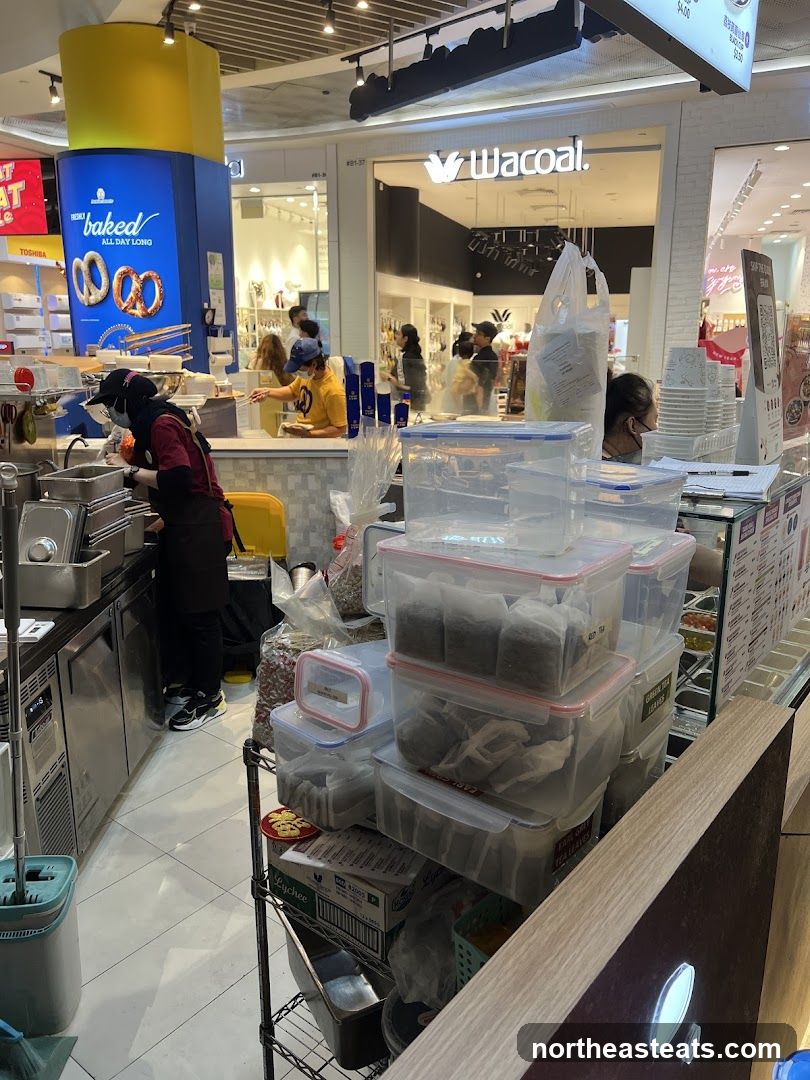 Food stall with tea bags and pretzels