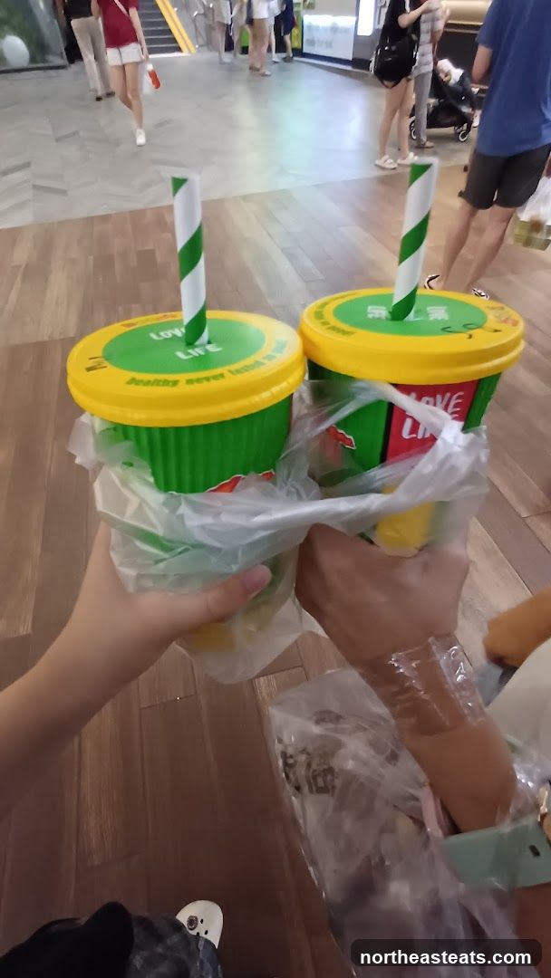 Two drinks with straws