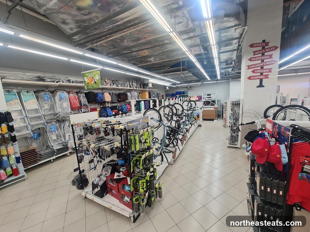 Indoor retail store with sporting goods and luggage