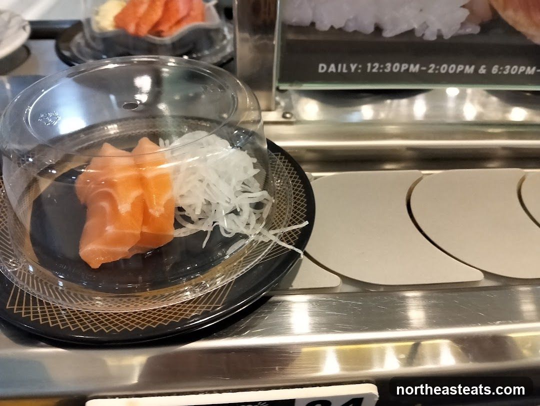 Salmon Sashimi on Conveyor Belt