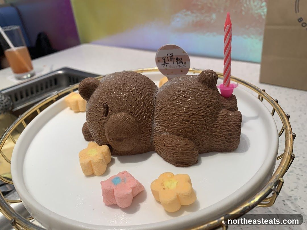 Bear-shaped dessert with candle