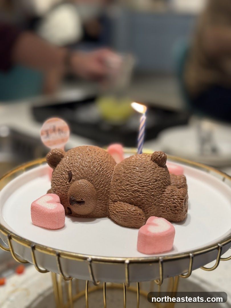 Bear-shaped cake with candle
