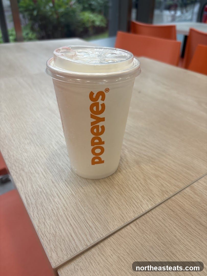 Popeyes cup on table