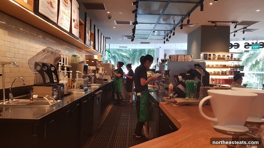 Baristas working behind a counter