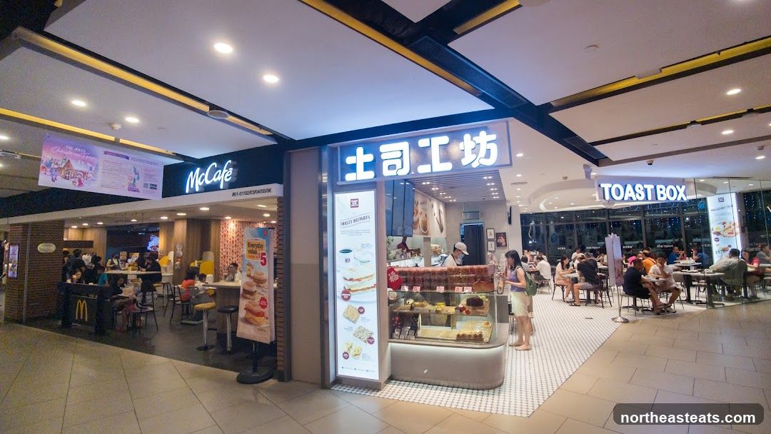 Food court with McCafe, Toast Box, and another eatery