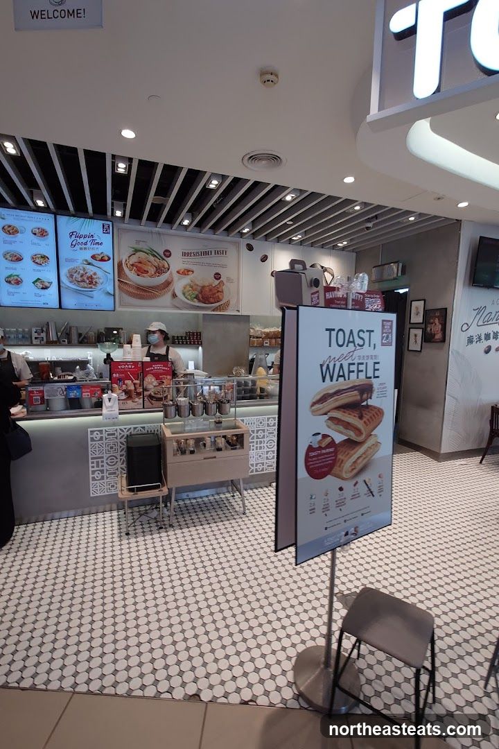 Food court stall with menu displays
