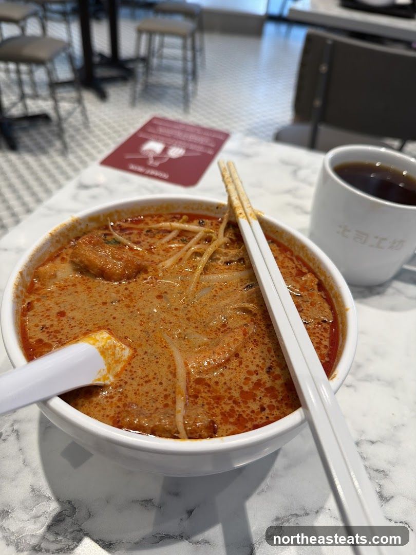 Bowl of Laksa with Coffee