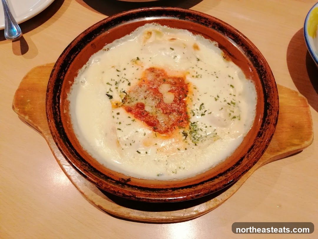 Baked Dish with Cheese and Tomato Sauce