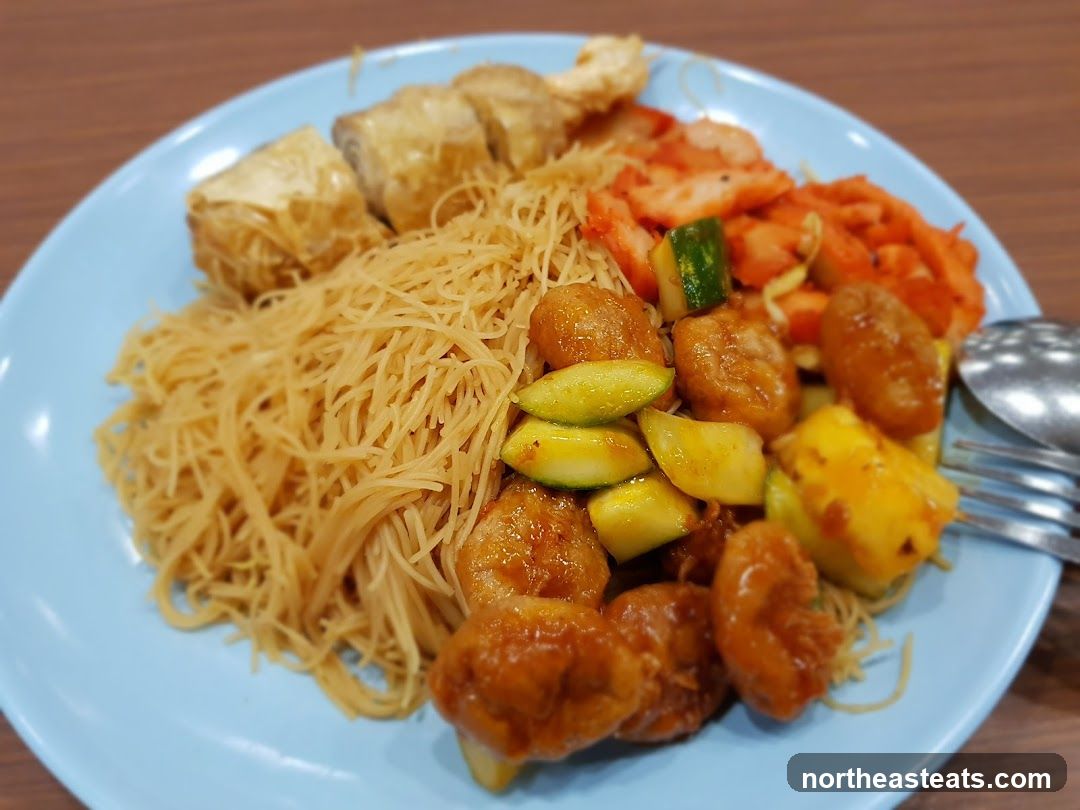 Plate of noodles with various toppings