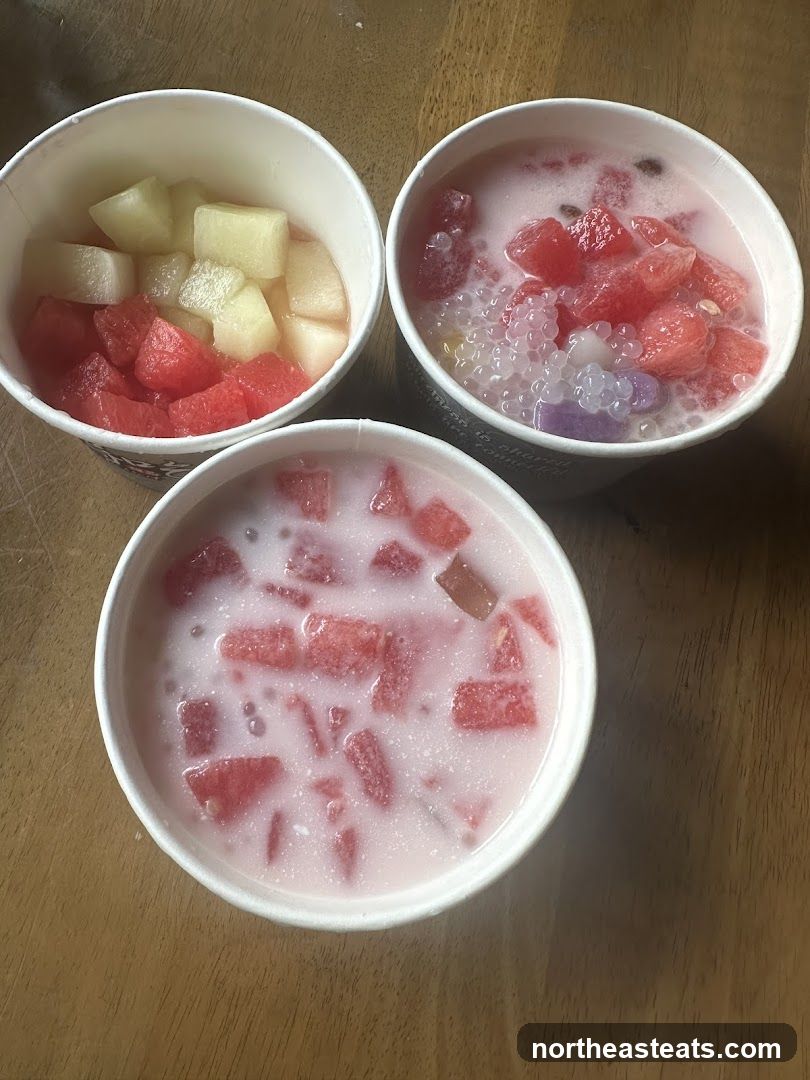 Three cups of fruit desserts