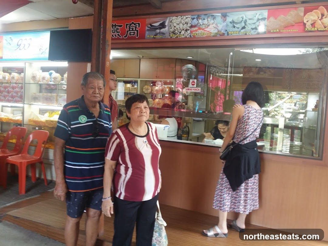 People in front of a shop