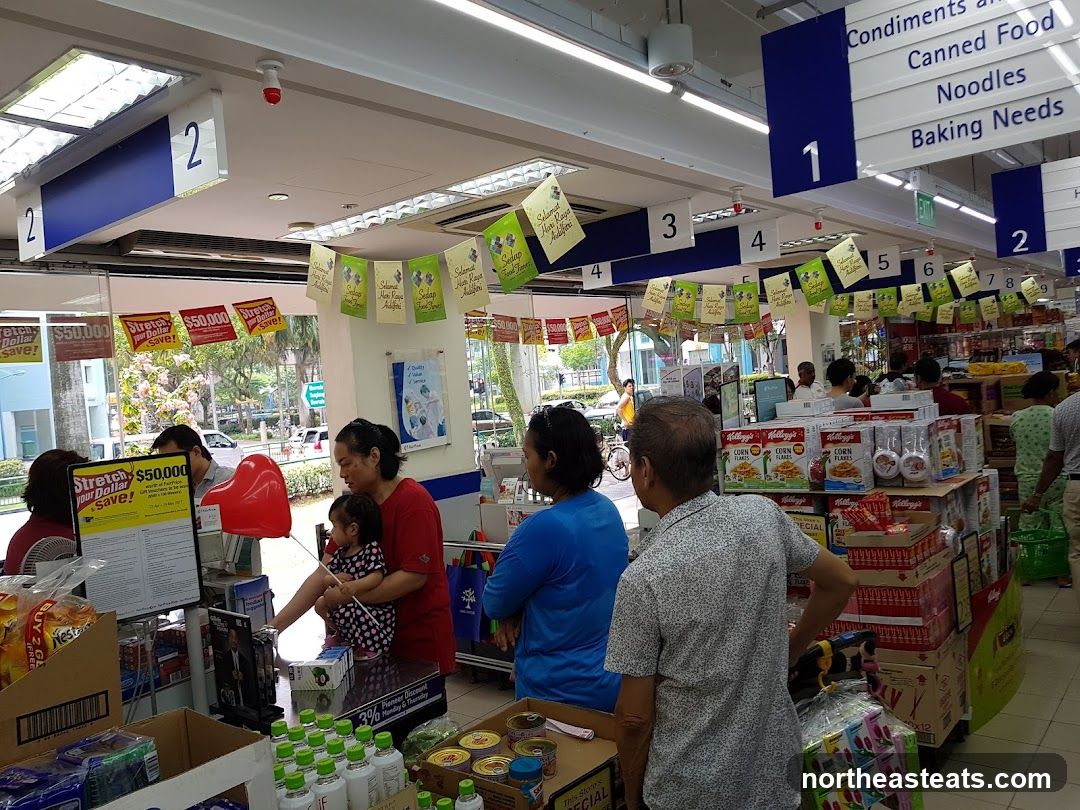 Supermarket aisle with shoppers
