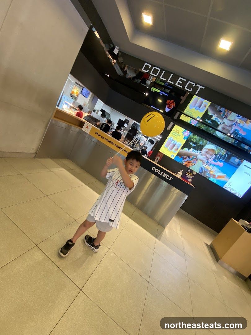 Boy with Balloon at McDonald's
