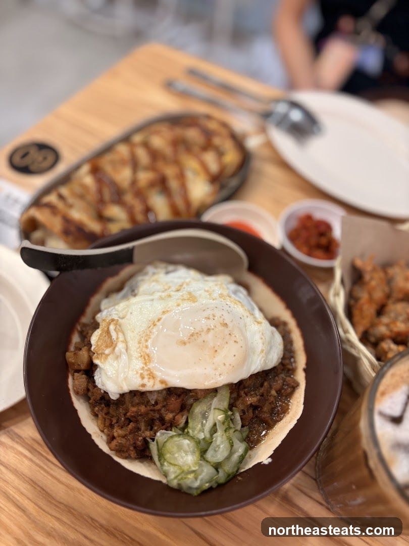 Savory Meal with Fried Egg and Pickles