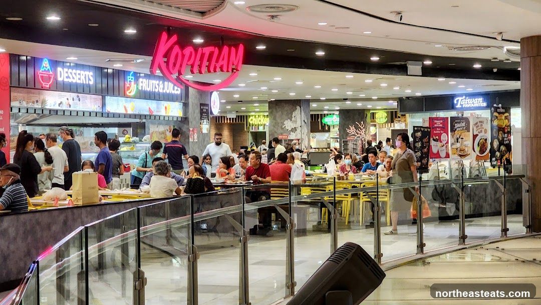 Food court with various stalls and diners