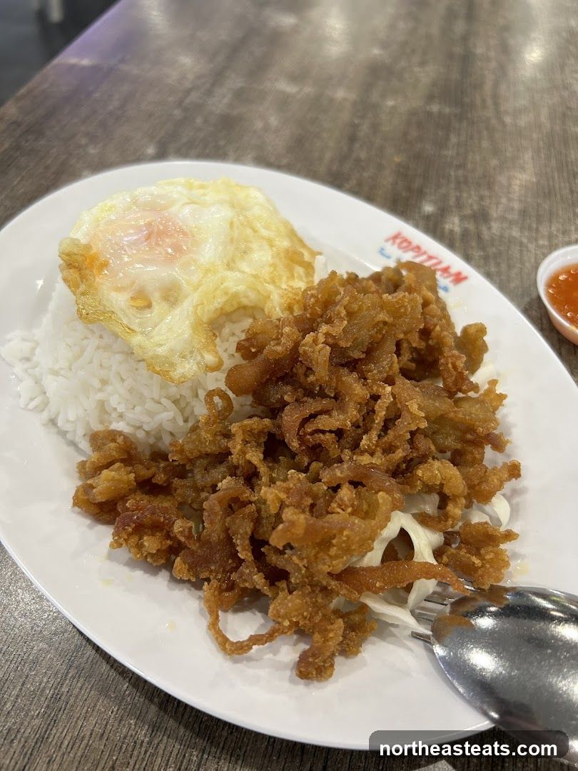 Crispy Chicken Rice with Fried Egg