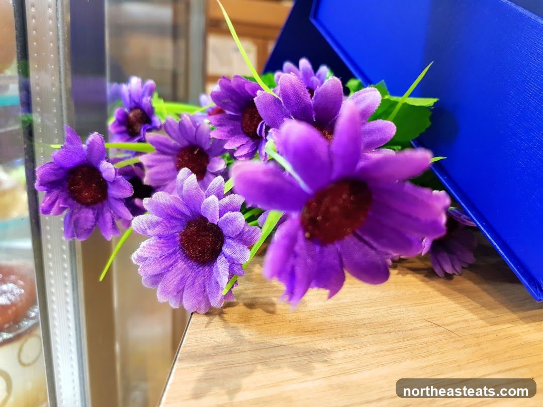 Artificial Flowers and Blue Box