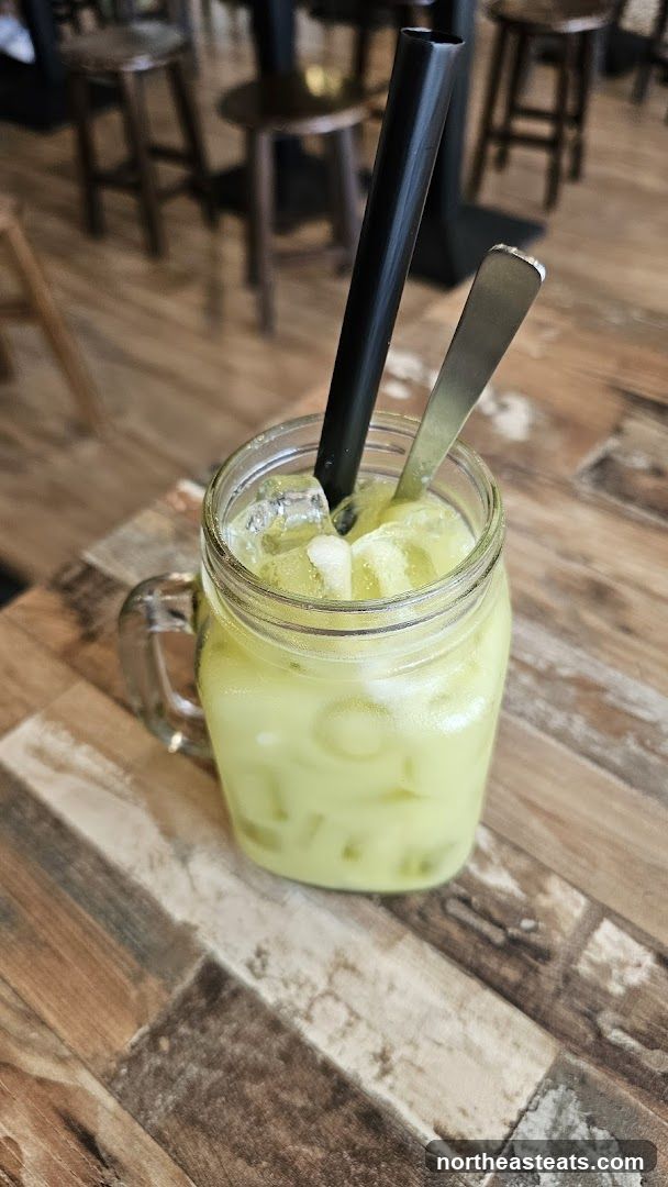 Green Drink with Straw and Spoon