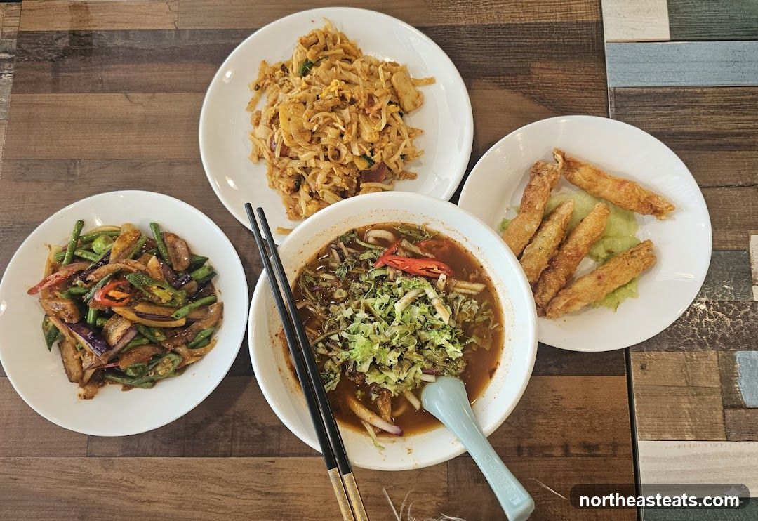 Four dishes on a wooden table