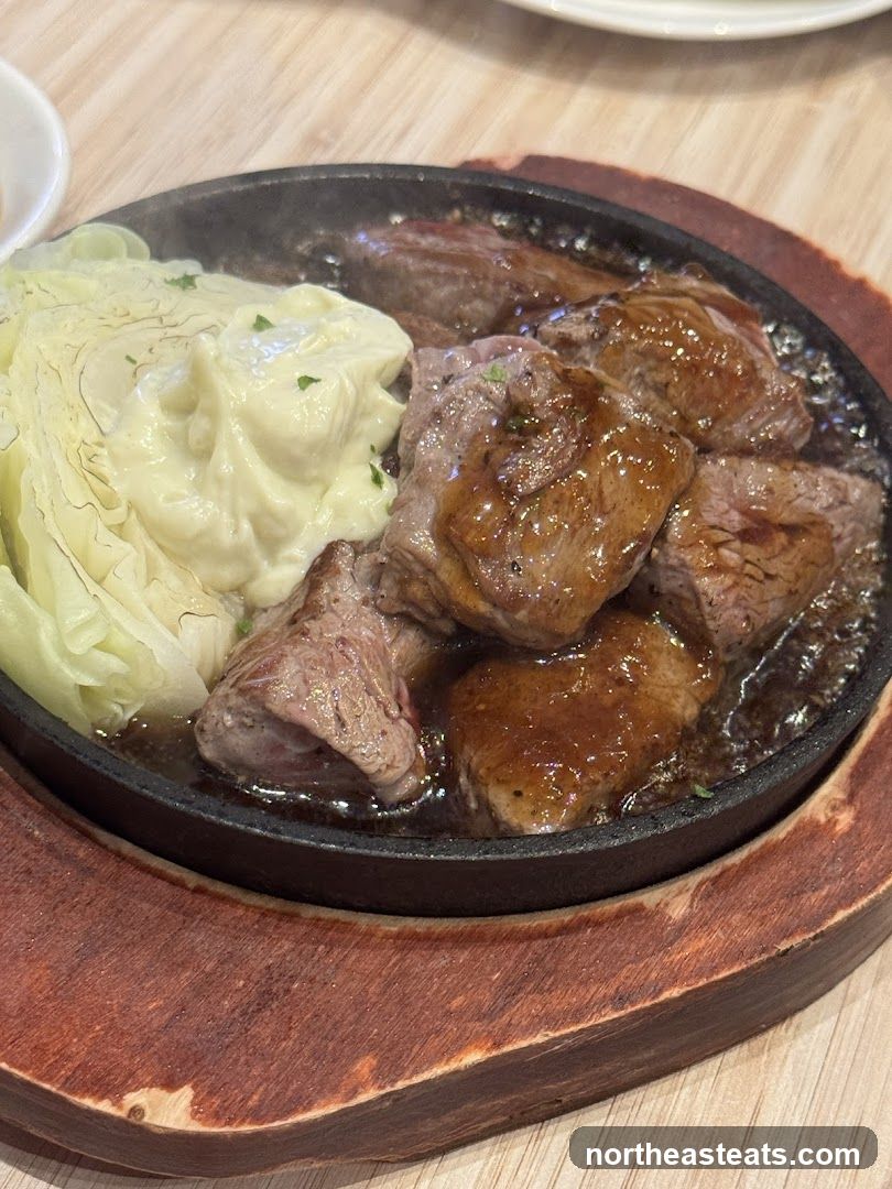 Sizzling Steak with Cabbage and Mashed Potatoes