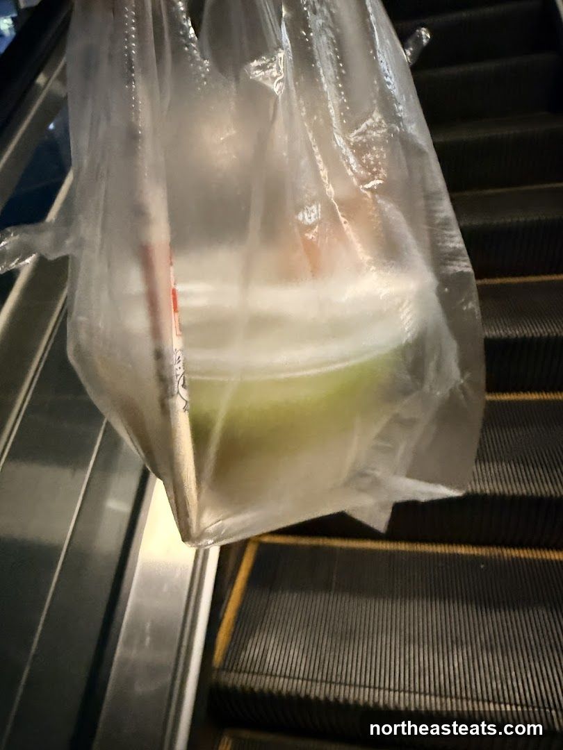 Takeaway Food Bag on Escalator