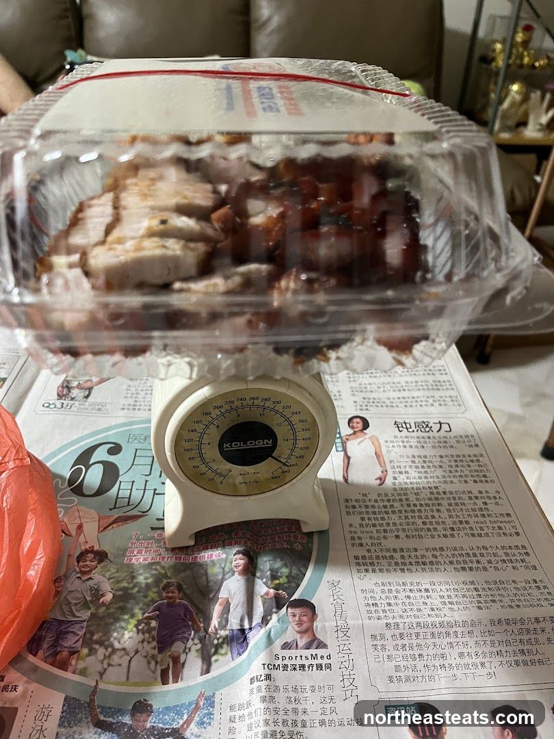 Meat in a container on a scale