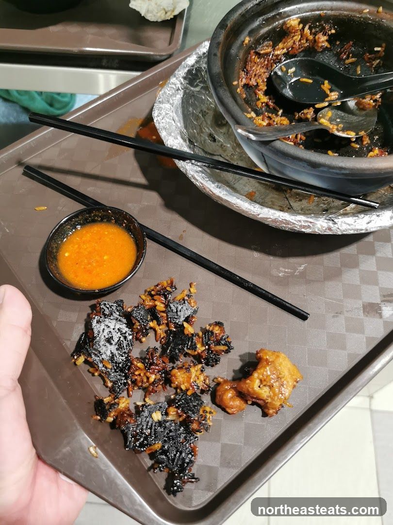 Burnt Rice and Chicken on Tray