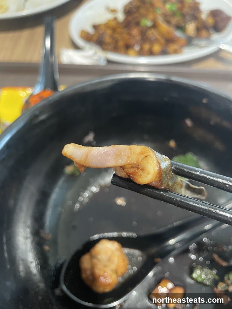 Close-up of food being eaten with chopsticks