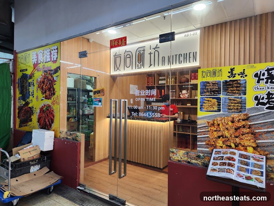 Restaurant storefront with food advertisements
