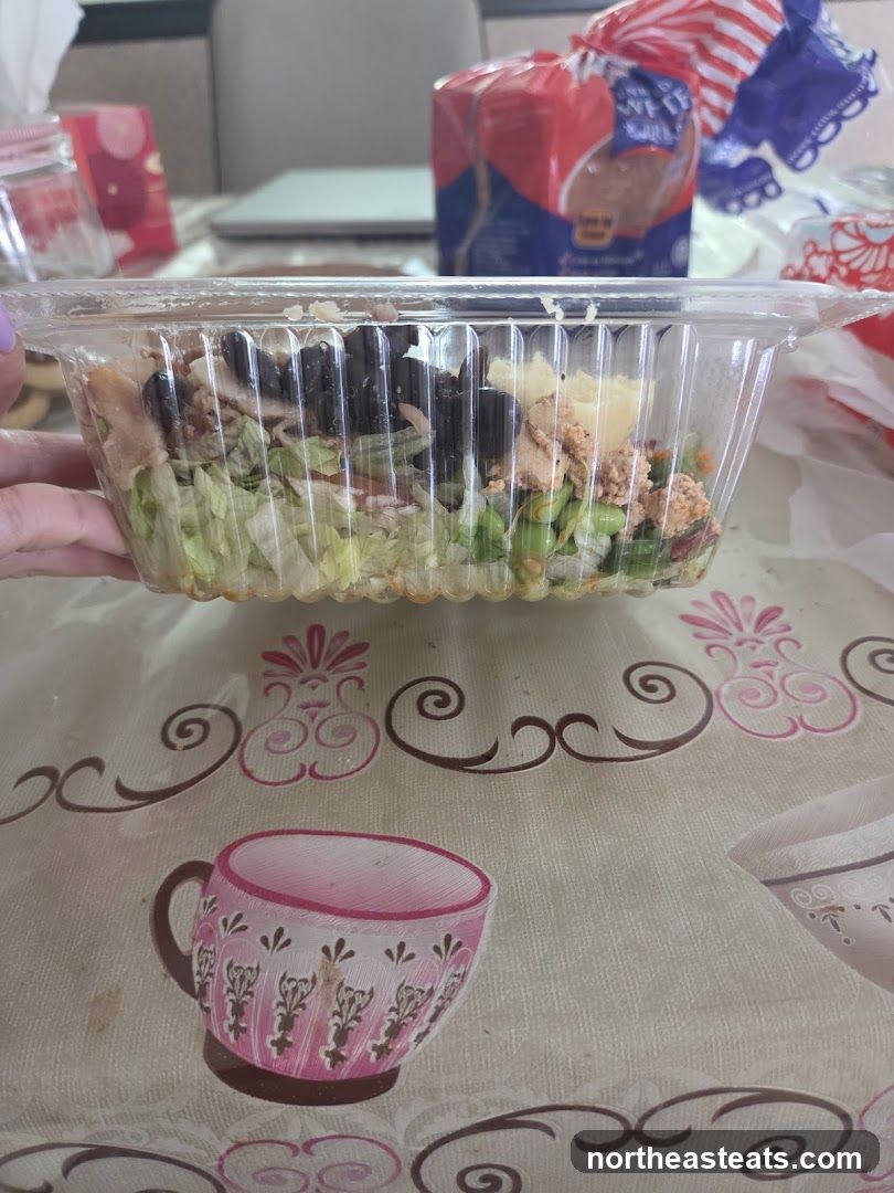 Salad in a plastic container