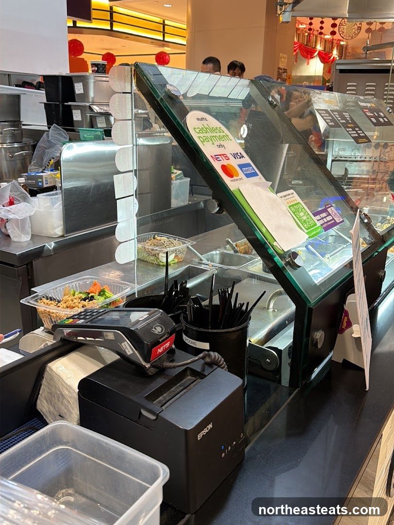 Food counter with payment terminal