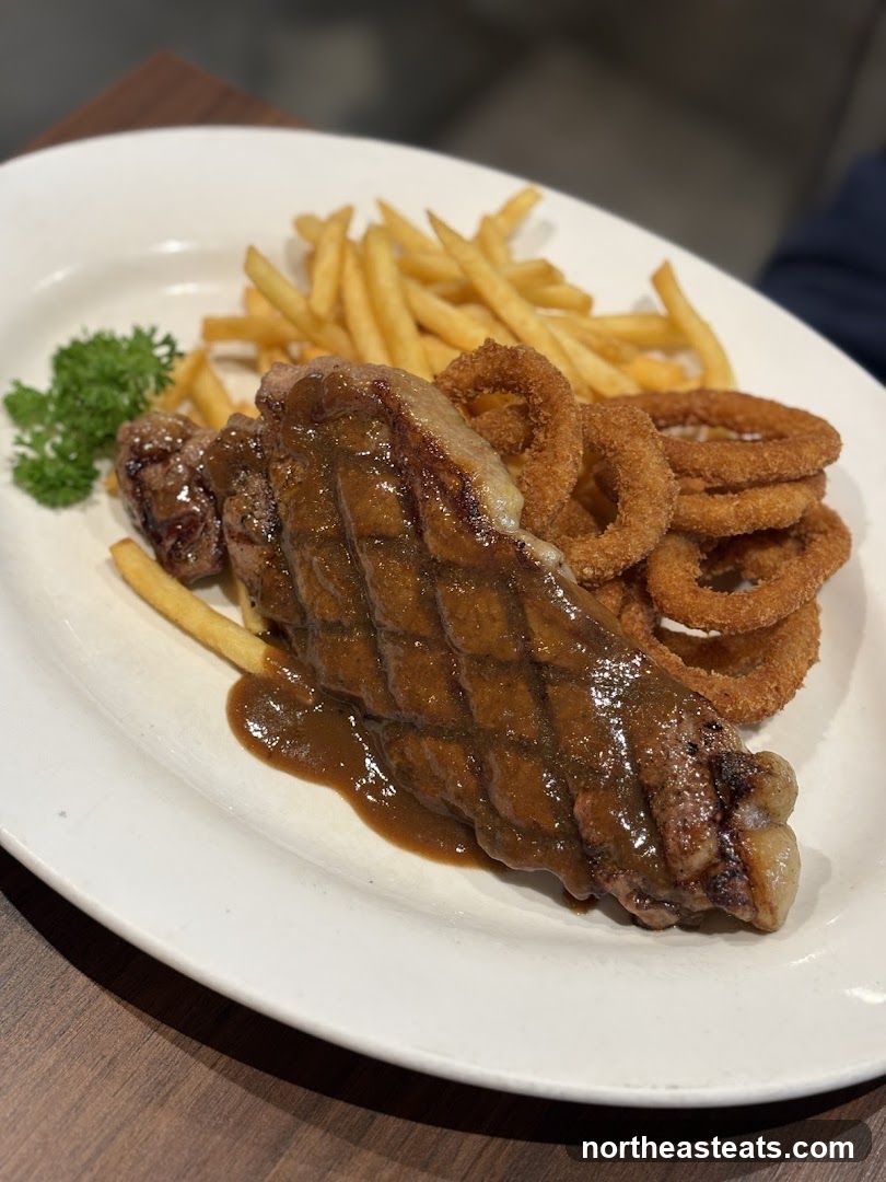 Steak with Fries and Onion Rings