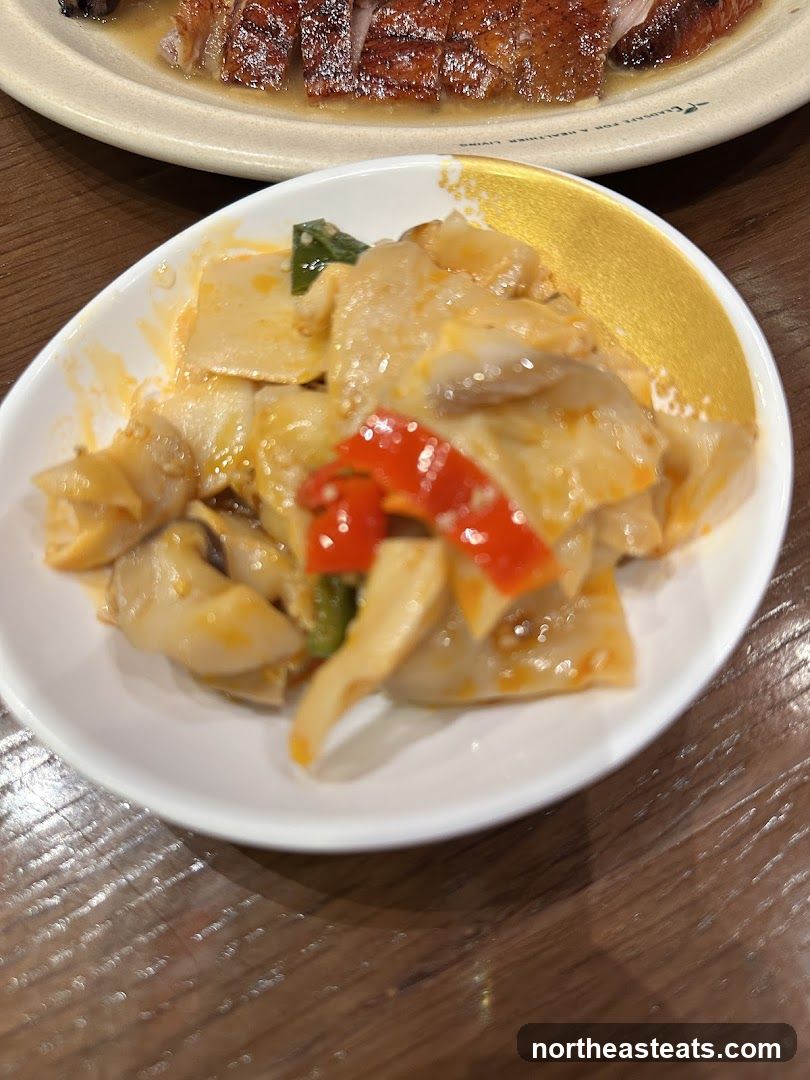 Stir-fried dish with bamboo shoots and red peppers