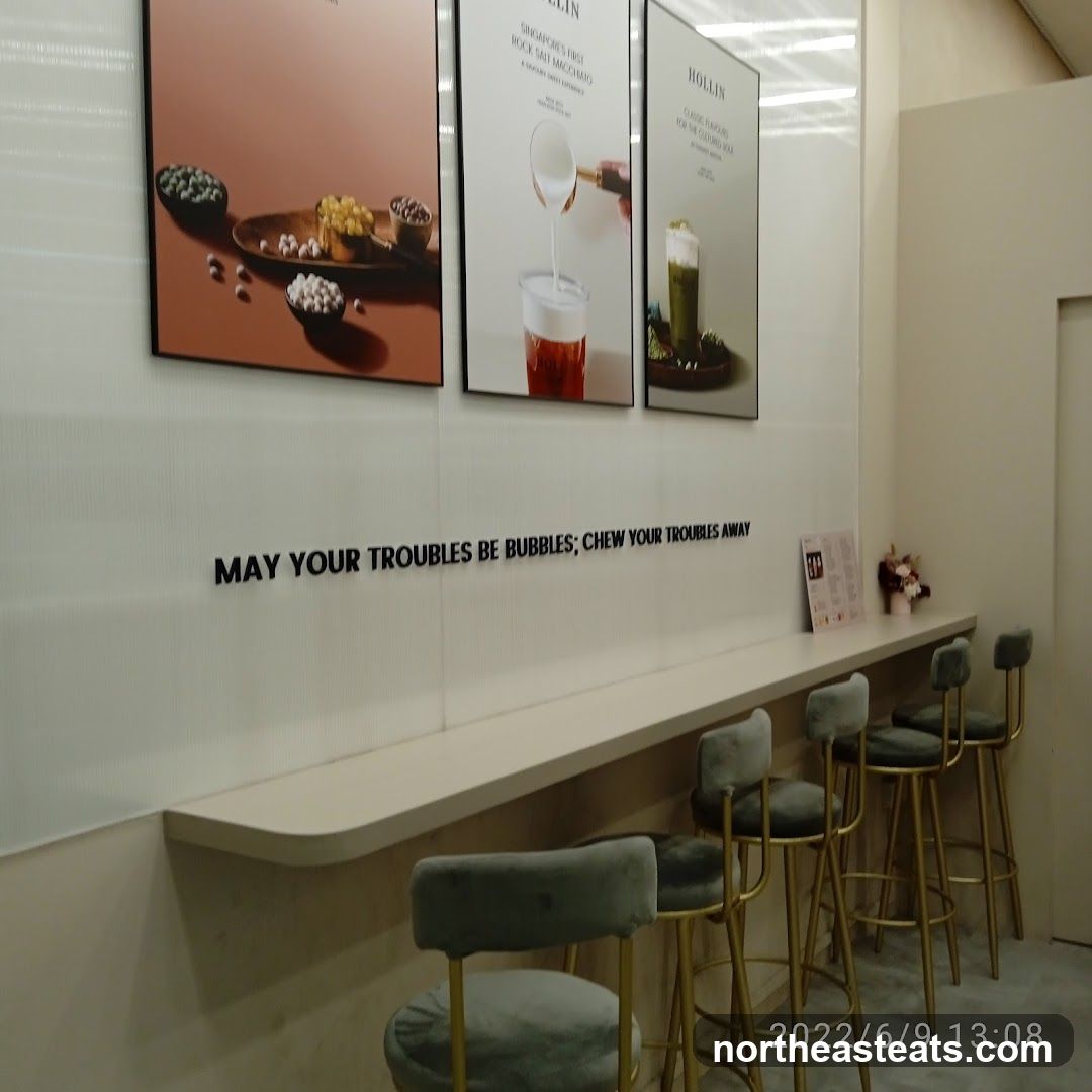 Bar Seating Area with Drink Advertisements